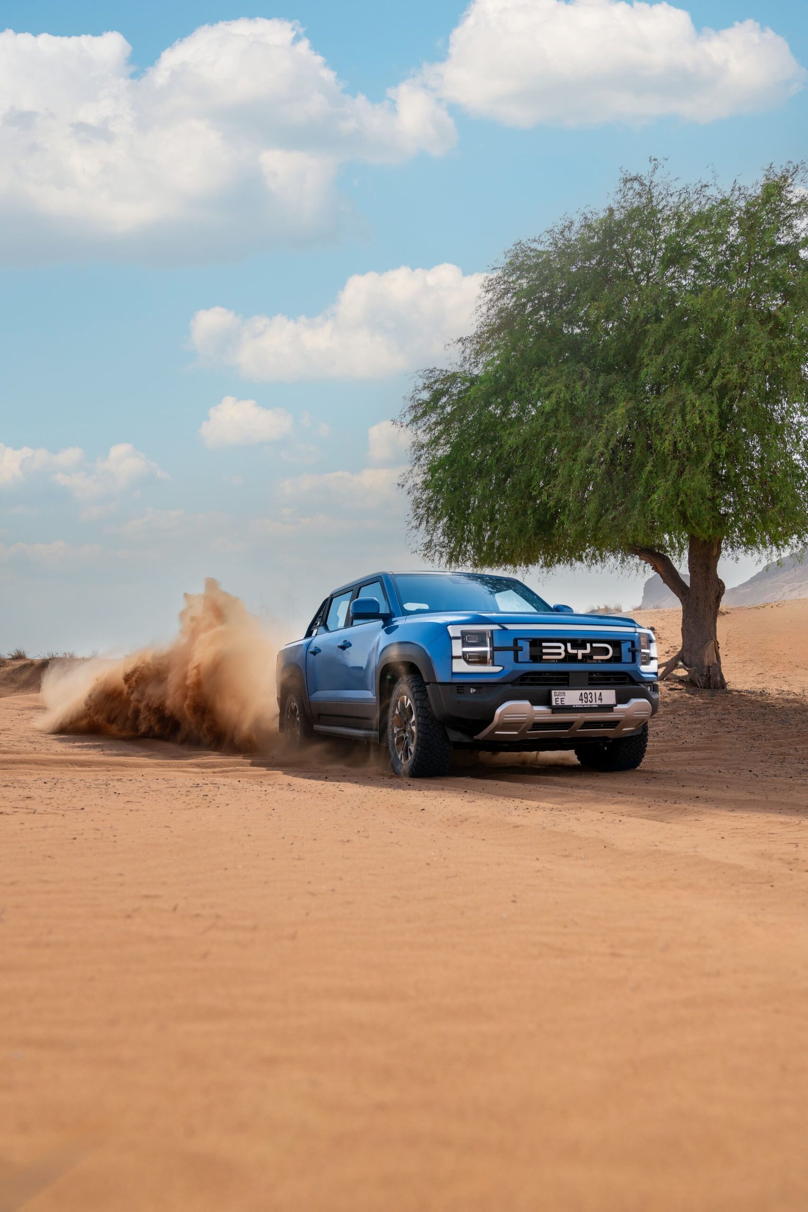 The UAE’s automotive landscape has entered a bold new era with the official launch of the BYD Shark 6, the region’s first plug-in hybrid pickup truck. Introduced by Al-Futtaim BYD UAE, this groundbreaking model combines cutting-edge hybrid power, rugged off-road performance, and a premium design, setting a new benchmark for what drivers in the UAE and GCC can expect from a modern pickup. With the BYD Shark, Al-Futtaim is not only expanding BYD’s product line in the Middle East but also driving the UAE closer to its national sustainability goals by offering consumers an advanced alternative that merges strength, efficiency, and eco-conscious engineering. A Game-Changing Entry Into the Pickup Segment For years, the UAE pickup market has been dominated by traditional combustion models. With the BYD Shark 6, Al-Futtaim BYD is disrupting this segment by introducing a plug-in hybrid electric vehicle (PHEV) that blends raw power with intelligent energy management. Built on BYD’s proprietary DMO Super-Hybrid platform, the Shark 6 is engineered to deliver the perfect balance between off-road toughness and everyday drivability. Unlike conventional pickups, the BYD Shark combines sustainability with performance, making it an appealing option for urban professionals, families, and adventure seekers alike. Unmatched Power, Torque, and Hybrid Performance The BYD Shark 6 features a 1.5L turbocharged petrol engine paired with dual electric motors, producing an incredible 429 horsepower and 650 Nm of torque. This allows the Shark to accelerate from 0–100 km/h in just 5.7 seconds — performance figures that place it at the top of its class. The hybrid powertrain isn’t just about speed. It provides a combined driving range of 520 km, alleviating range anxiety and giving drivers the confidence to travel long distances across the UAE and beyond. With a towing capacity of 2.5 tonnes, the Shark 6 is equally at home on construction sites, desert trails, or family getaways. Three drive modes — Mud, Sand, and Snow — make the BYD Shark a versatile companion, whether tackling the golden dunes of the UAE desert, navigating rugged mountain paths in Ras Al Khaimah, or handling slippery conditions in colder regions. BYD Shark 6 Launches in UAE Shark-Inspired Design That Turns Heads As its name suggests, the BYD Shark draws design inspiration from the power and elegance of the ocean predator. The front grille and headlights evoke the image of a shark’s open mouth, while the sleek rear tail-light mimics a shark’s fin. This bold aesthetic gives the Shark a commanding road presence that stands out in the crowded pickup segment. Inside, BYD has focused on creating a cabin that merges comfort with high-end technology. Features include: 12.8-inch Intelligent Rotating Touchscreen (portrait & landscape modes). 10.25-inch LCD digital cluster. 8-speaker Dirac sound system. Ventilated, premium seats designed for the UAE climate. Head-Up Display (HUD) for safer driving. Every detail is carefully crafted to ensure both driver and passengers enjoy a comfortable, connected, and modern experience. Advanced Safety and Smart Utility The BYD Shark 6 is not just powerful — it’s safe and intelligent. With a 5-Star Latin NCAP Safety Rating, it ensures maximum protection for all occupants. Key safety and utility highlights include: 360° Surround View camera for effortless maneuvering. Adaptive Cruise Control (ACC) for safe highway driving. Long-travel double wishbone suspension for smoother rides across rough terrain. Vehicle-to-Load (V2L) capability, allowing owners to power external devices directly from the pickup — perfect for camping trips, outdoor events, or emergencies. These features make the BYD Shark one of the most practical and versatile pickups available in the UAE today. Sustainability Meets Adventure Al-Futtaim BYD is committed to supporting the UAE’s green mobility initiatives, and the Shark 6 plays a crucial role in this journey. As the country continues to invest in EV charging infrastructure and clean energy adoption, the BYD Shark offers a bridge between traditional fuel-powered vehicles and full electric mobility. Its plug-in hybrid system ensures drivers enjoy the benefits of lower emissions without sacrificing the freedom, power, and reliability expected from a pickup. Availability Across the UAE The BYD Shark 6 is now available for viewing and test drives at all BYD UAE showrooms across Dubai, Abu Dhabi, Sharjah, Ras Al Khaimah, and Al Ain. Starting 25 September 2025, customers can experience first-hand why the Shark 6 is being hailed as a game-changer in the pickup segment. Backed by Al-Futtaim’s extensive ecosystem — including CHARGE2MOOV charging infrastructure, aftersales service, mobile support, and tailored financing solutions — owning a BYD Shark has never been easier or more accessible. Why the BYD Shark 6 Matters to the UAE The arrival of the BYD Shark 6 signals more than just a new vehicle; it represents the UAE’s continued evolution toward smart, sustainable mobility. With its combination of class-leading power, futuristic design, advanced safety, and eco-friendly hybrid technology, the Shark is perfectly aligned with the UAE’s vision of becoming a hub for new energy vehicles. For Al-Futtaim BYD, the Shark 6 is a bold step forward in its mission to make sustainable driving not only accessible but aspirational. For UAE drivers, it’s the perfect balance of power, luxury, and responsibility. The launch of the BYD Shark 6 in the UAE marks a watershed moment for the region’s automotive sector. As the first plug-in hybrid pickup in the Middle East, it sets a new standard for performance, sustainability, and design. Backed by Al-Futtaim BYD, the Shark 6 is more than just a vehicle — it’s a statement of innovation, ambition, and the future of mobility in the UAE. For those seeking a pickup that combines strength, intelligence, and sustainability, the BYD Shark is ready to make waves.